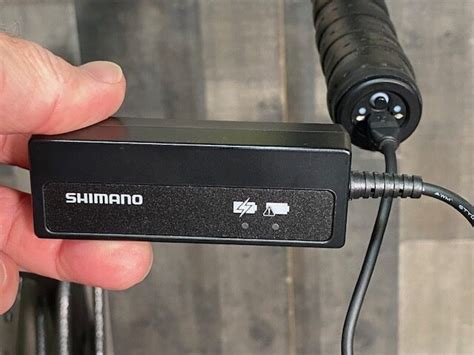 shimano di2 junction box button|how to charge di2 shifters.